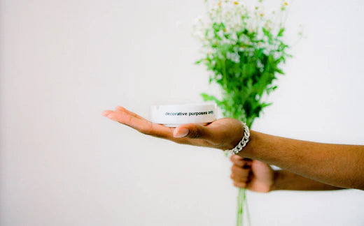 Ashtray in the palm of a hand
